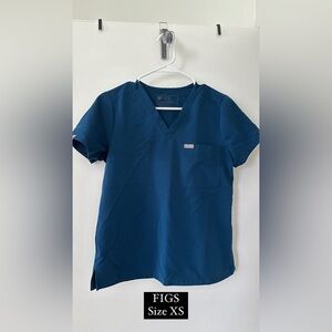 FIGS scrub top. Deep reef/dark blue color